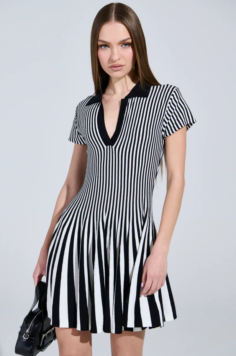 ALINA PLEATED KNIT FIT AND FLARE MINI DRESS IN BLACK AND WHITE - Image 2