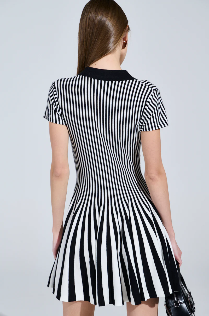ALINA PLEATED KNIT FIT AND FLARE MINI DRESS IN BLACK AND WHITE - Image 4