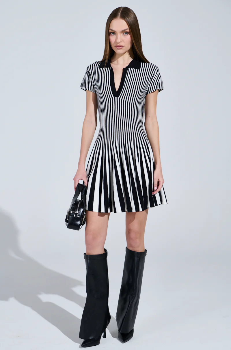 ALINA PLEATED KNIT FIT AND FLARE MINI DRESS IN BLACK AND WHITE - Image 6