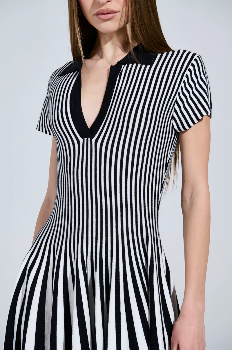 ALINA PLEATED KNIT FIT AND FLARE MINI DRESS IN BLACK AND WHITE - Image 7