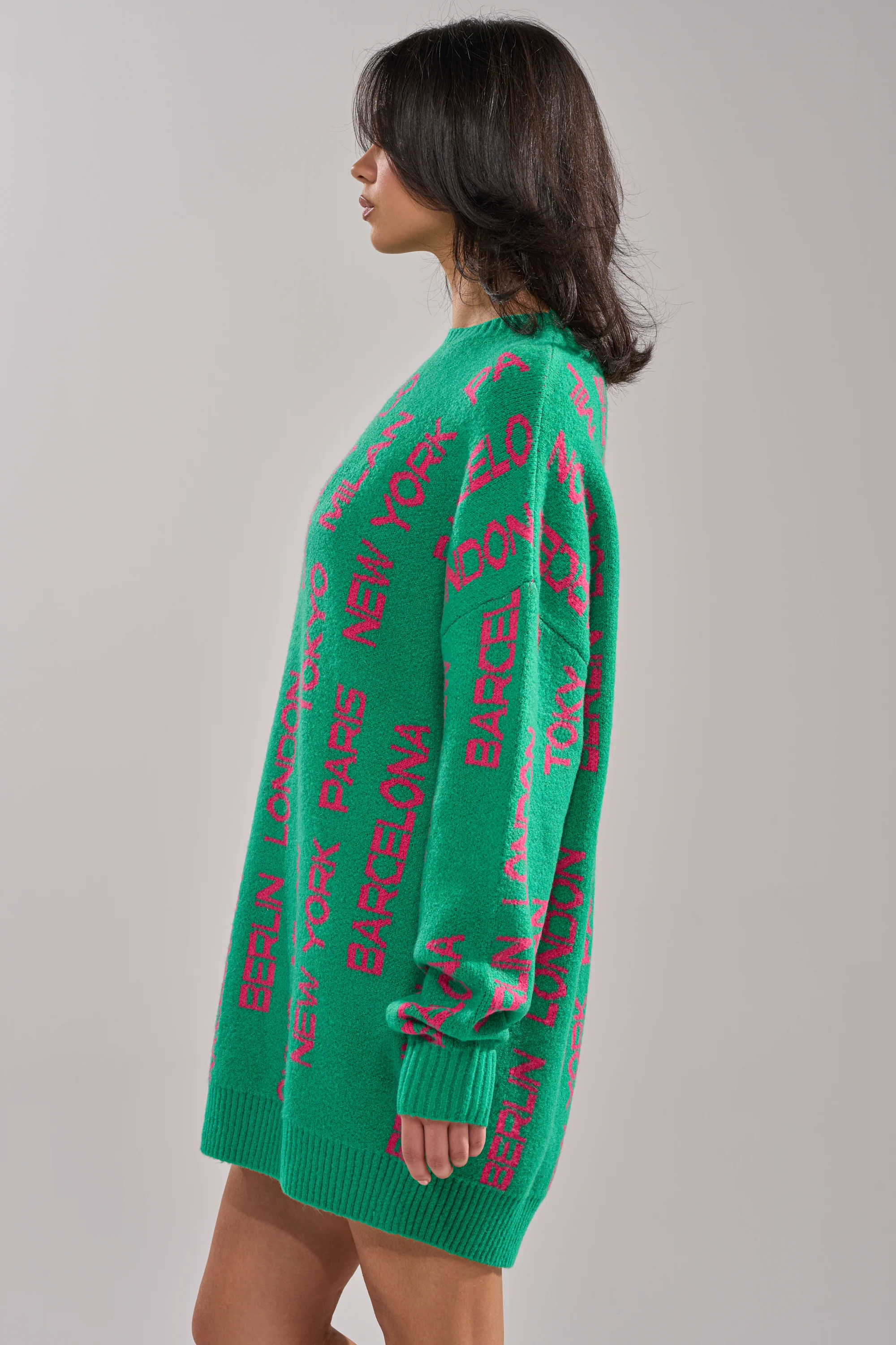 AROUND THE WORLD SWEATER MINI DRESS IN GREEN - Image 2