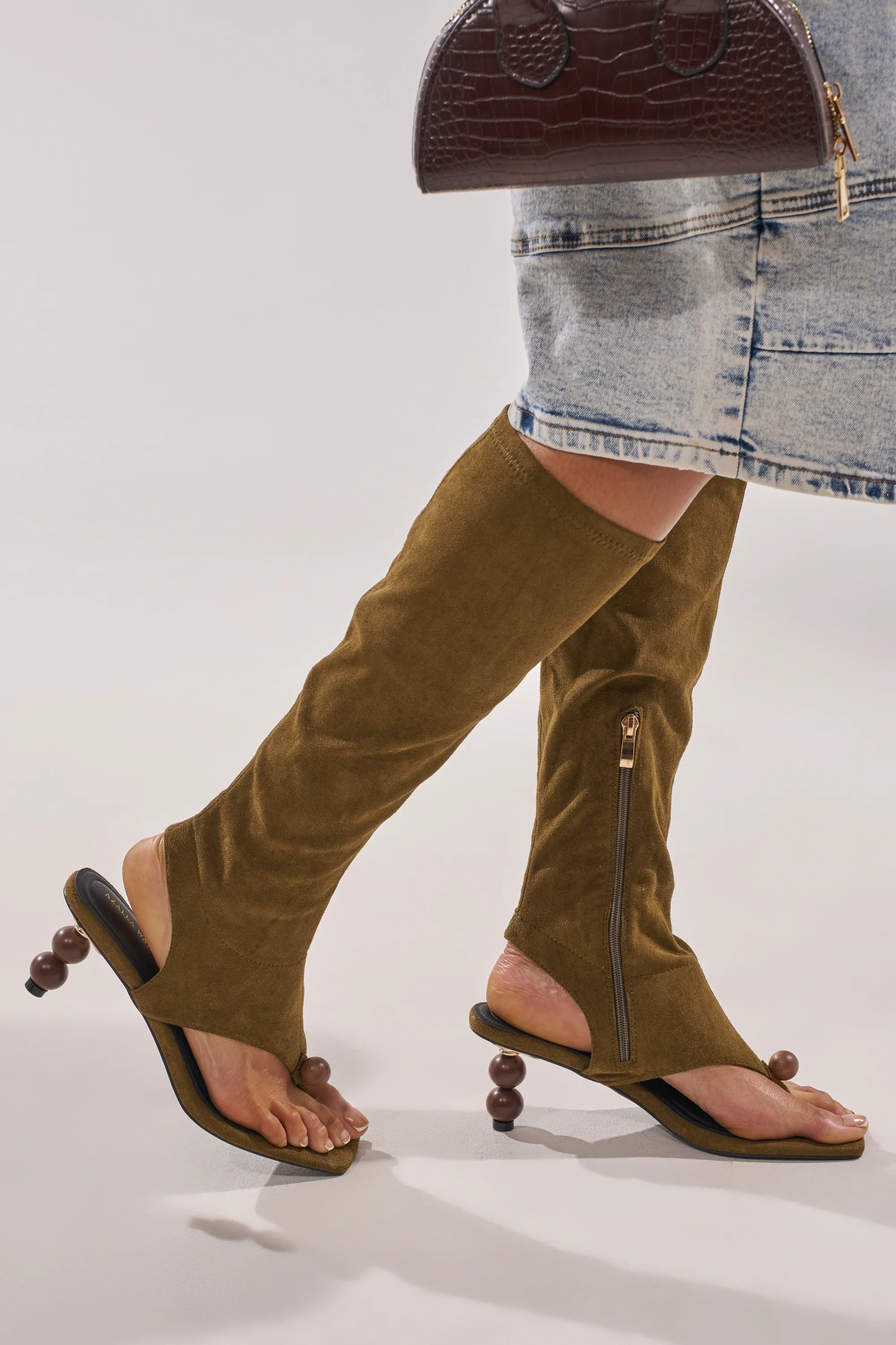AZALEA WANG DOTTIE OLIVE STRETCH FAUX SUEDE BOOT WITH EMBELLISHED HEEL AND TOE HARDWARE - Image 2