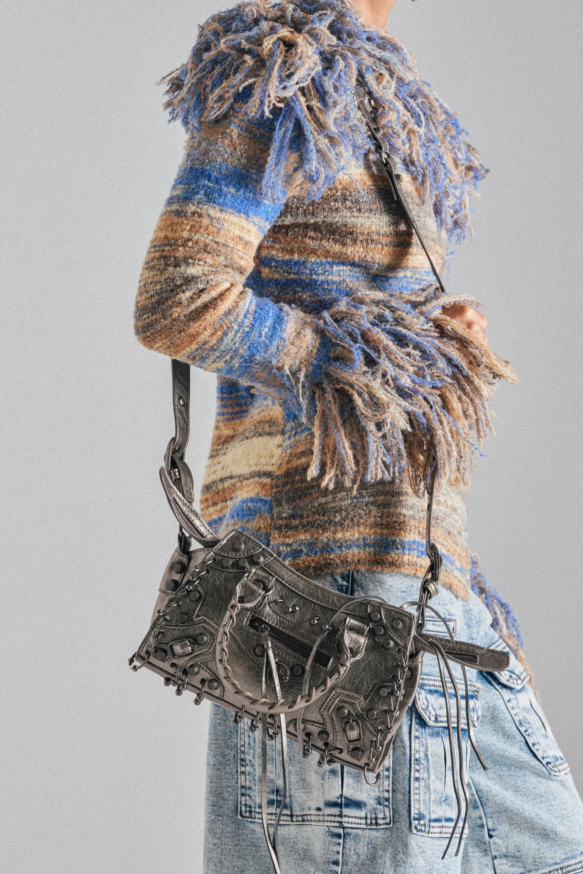GRUNGE PIERCED PURSE