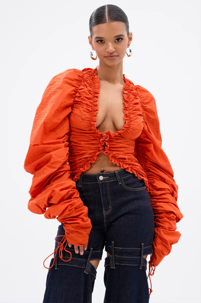 IN IT TO WIN IT RUCHED BLOUSE