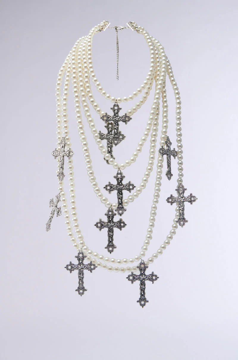 PROTECTED LAYERED CROSS NECKLACE