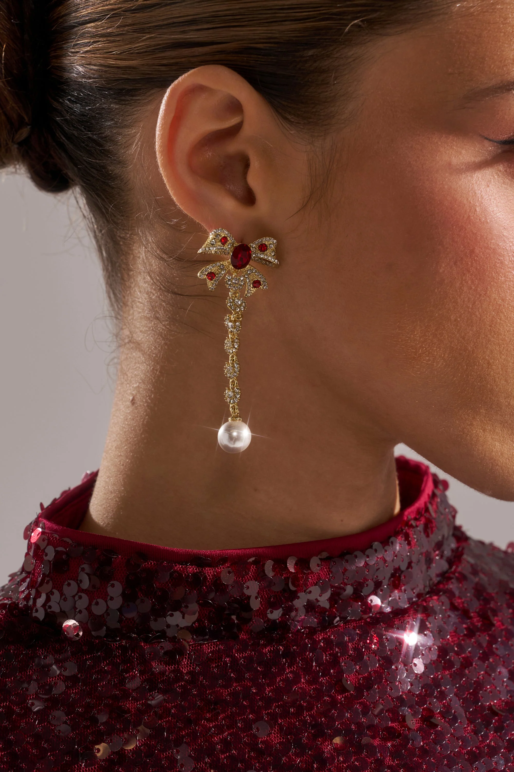 TIE WITH A BOW EARRING - Image 2
