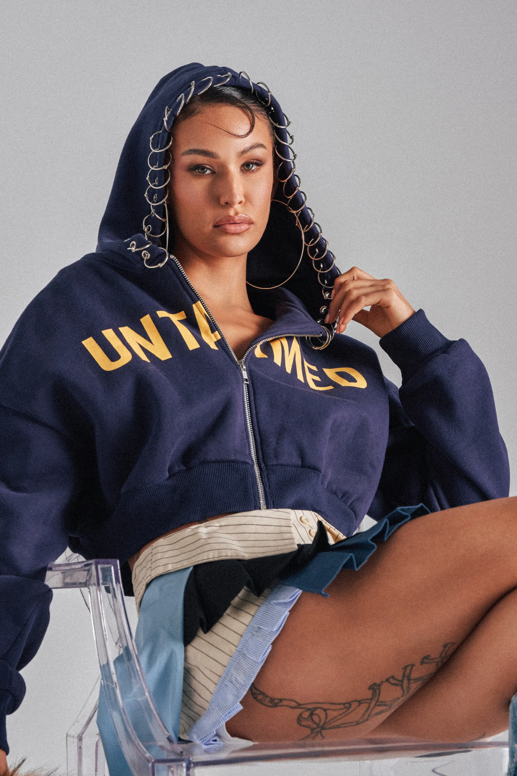 UNTAMED METAL RING SWEATSHIRT