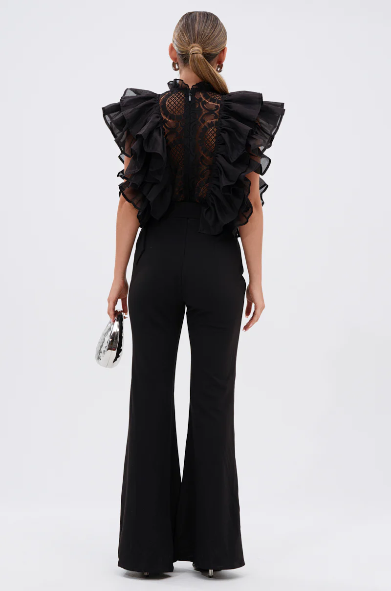 WALK THAT WALK RUFFLE JUMPSUIT IN BLACK - Image 4