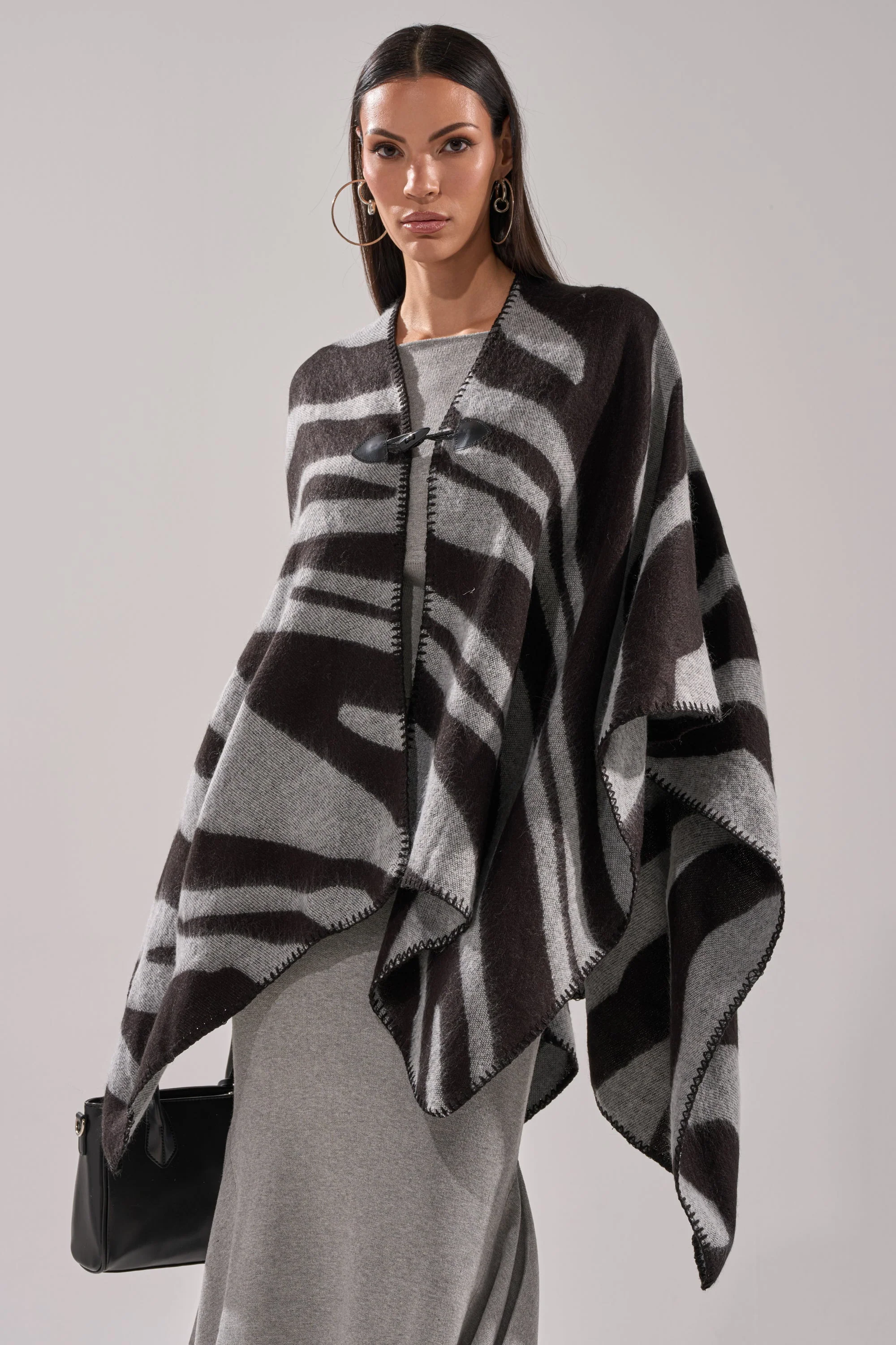 WILD CHILD KNIT PONCHO