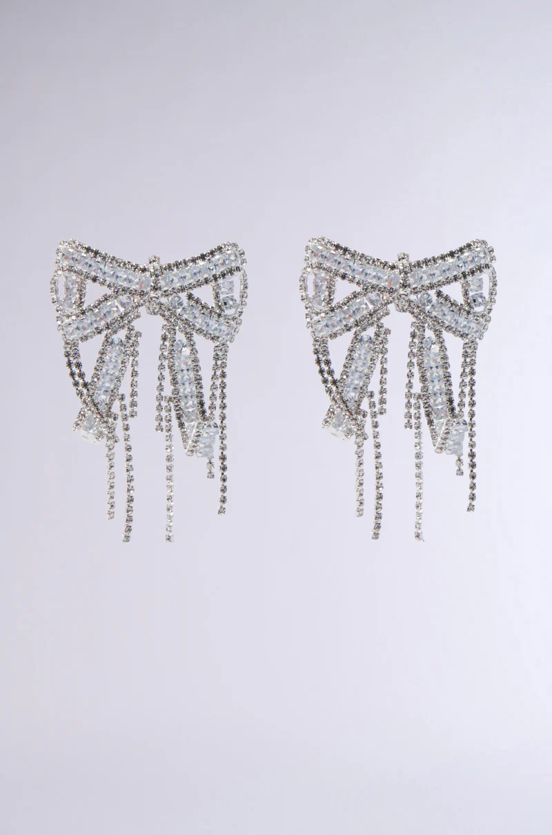 WITH A BOW EARRING