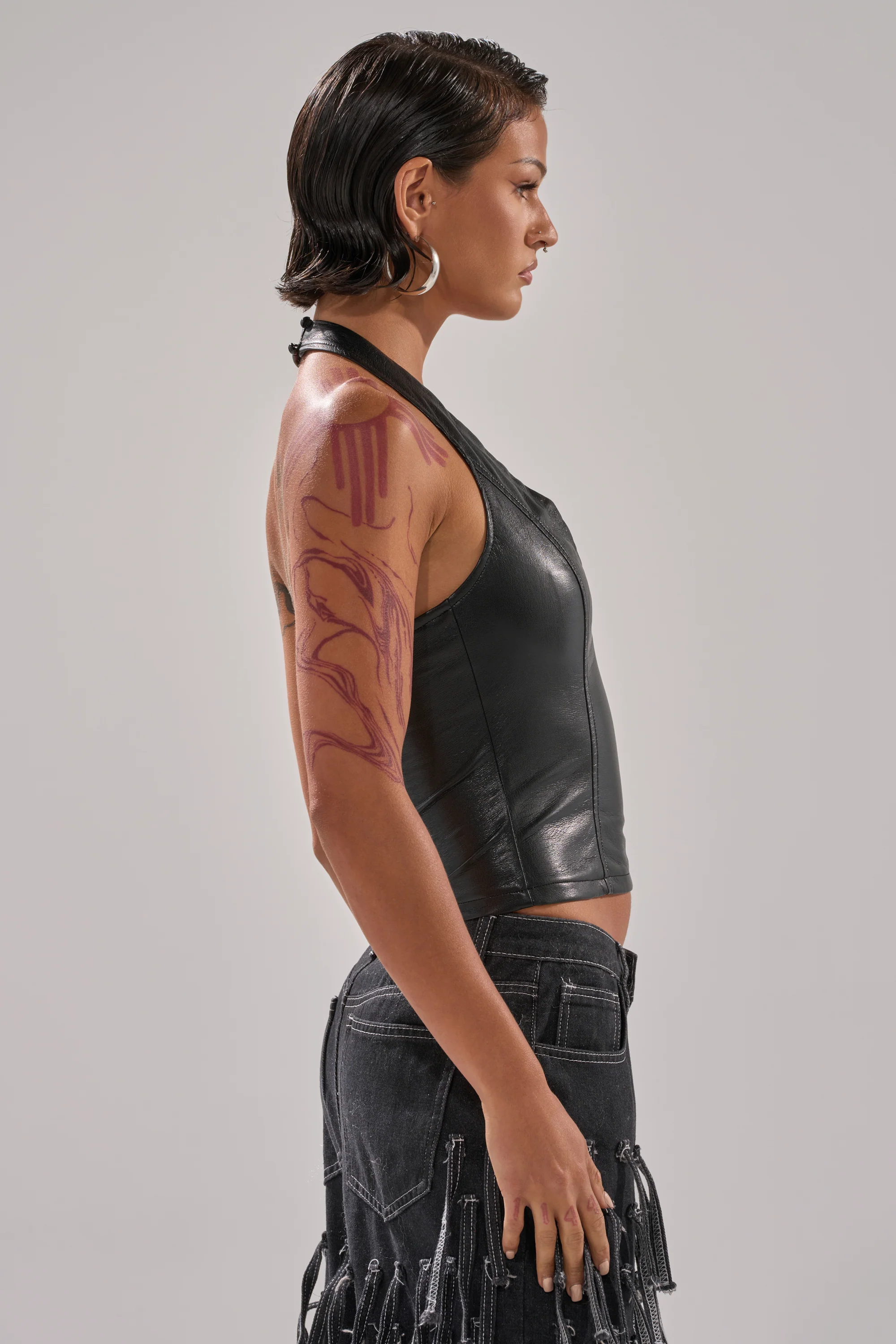 WITHOUT A DOUBT FAUX LEATHER HALTER NECK CORSET IN BLACK - Image 3