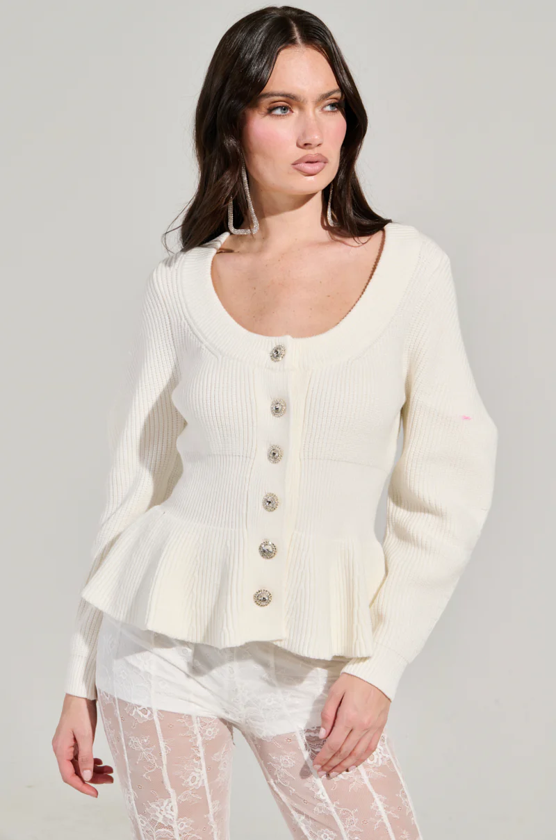 WORTH A MILLION PEPLUM SWEATER IN WHITE
